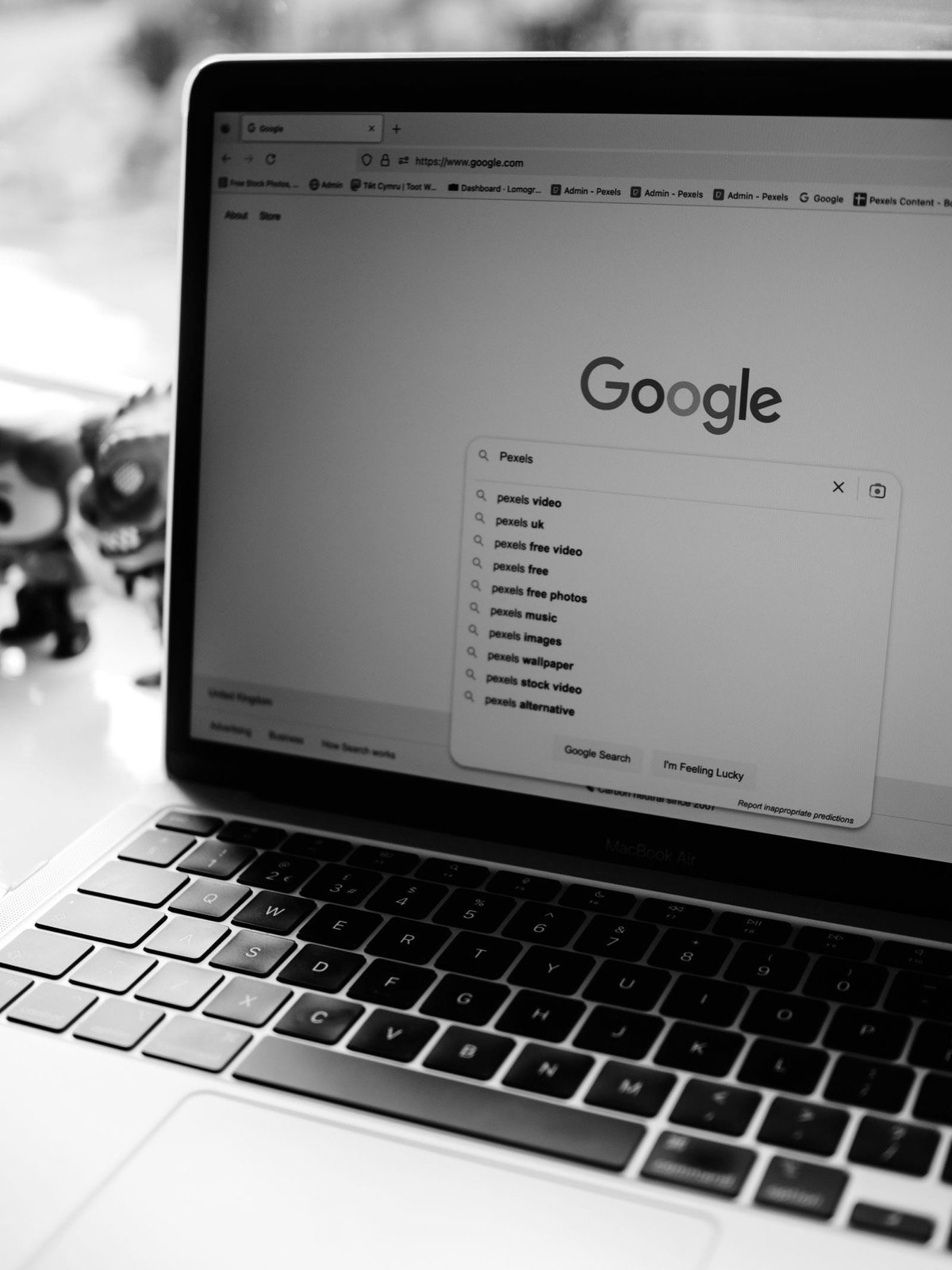 A laptop open on the Google search page